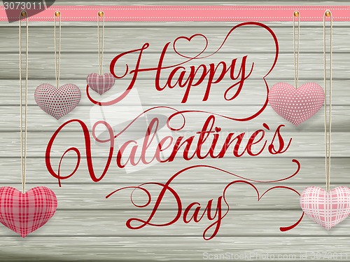 Image of Valentines day toy hearts hanging on rope. EPS 10