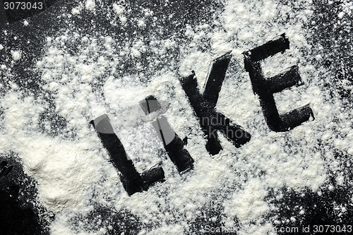 Image of Thumbs up made out of flour