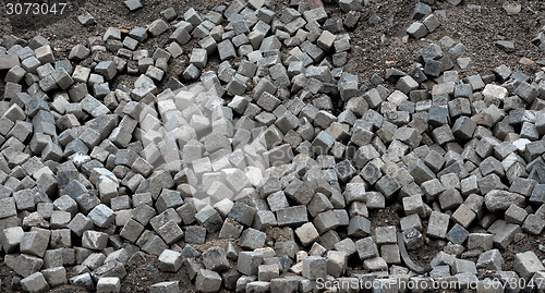 Image of Crawl destroyed urban sidewalk stones