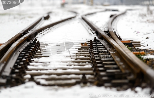 Image of Railroad tracks in the snow