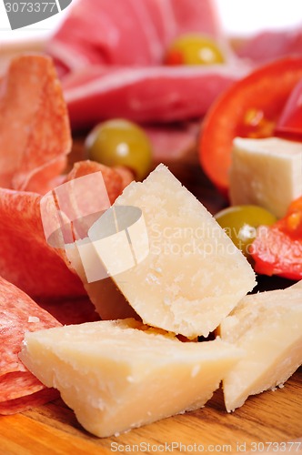 Image of Wooden tray with prosciutto