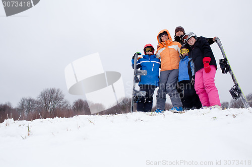 Image of Family on ski holiday in mountains