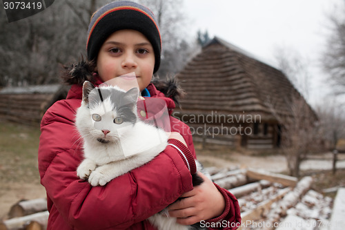 Image of Boy with cat