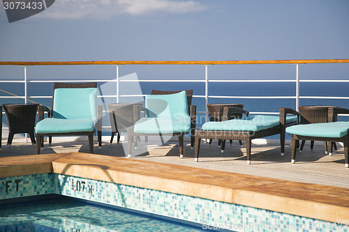 Image of Cruise Ship Lounge Chairs And Pool Abstract