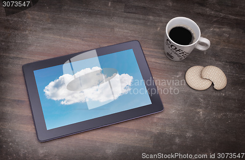 Image of Cloud-computing connection on a digital tablet pc