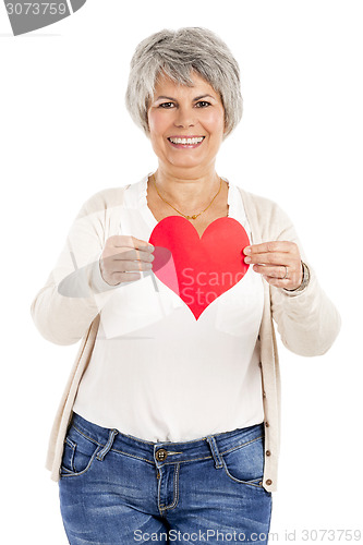 Image of Holding a heart in her hands