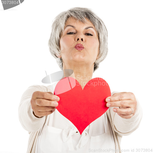 Image of Holding a heart in her hands