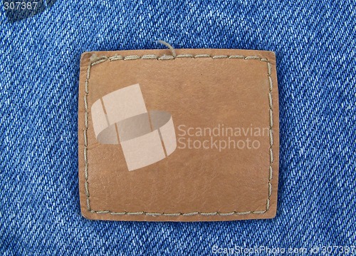 Image of Blank Leather Tag on Denim