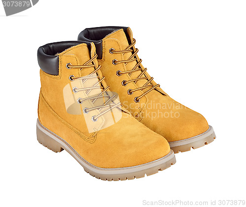 Image of Yellow leather boots isolated on white background with clipping 