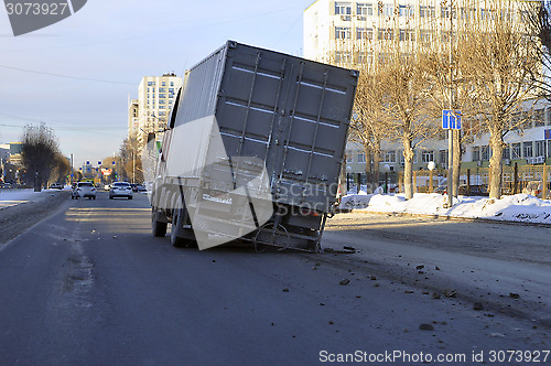 Image of Accident. The truck with the spoiled wheel costs in the middle o