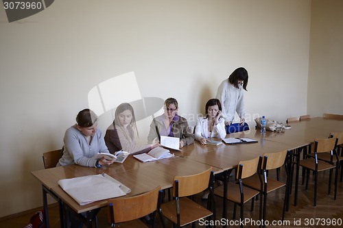 Image of Polish students at final examination