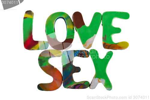 Image of Sex and love spelled out using colored plasticine 