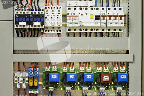 Image of Electrical panel with fuses and contactors
