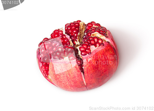 Image of Broken Bright Ripe Delicious Juicy Pomegranate Top View Rotated