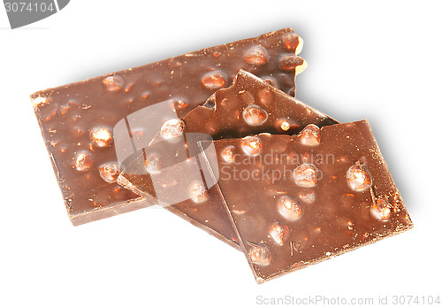 Image of Pieces of dark chocolate with hazelnuts