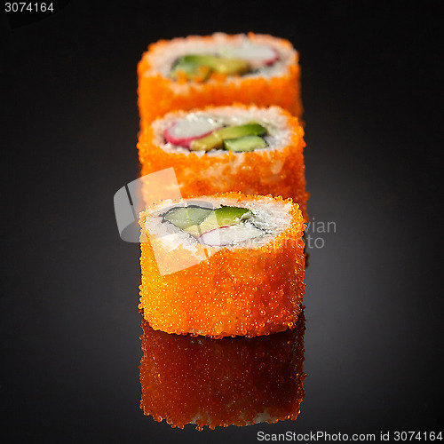 Image of sushi with cucumber and crab sticks