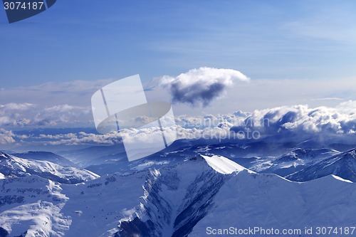 Image of Winter mountains at nice evening and sunlight clouds