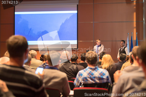 Image of Public speaker at Business Conference.