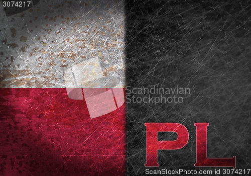Image of Old rusty metal sign with a flag and country abbreviation
