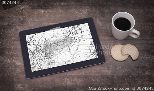 Image of Tablet computer with broken glass