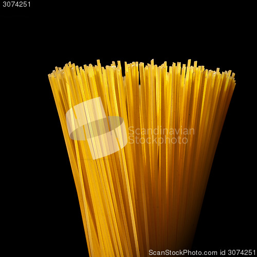 Image of italian spaghetti isolated on black