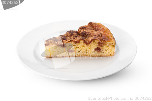 Image of Slice of cake on plate isolated on white