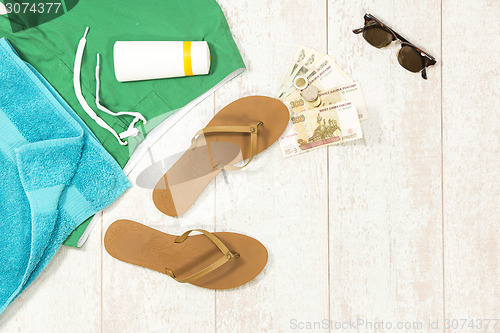 Image of Beach Supplies With Money On Floorboard