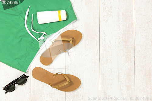 Image of Beach Supplies On Floorboard