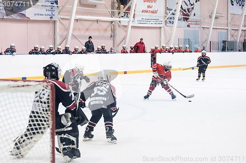 Image of Children hockey. Attack of gate