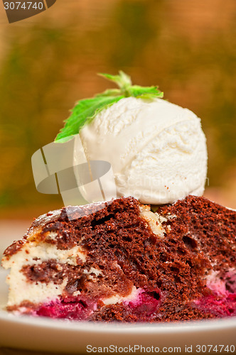 Image of chocolate cake with jam ice cream
