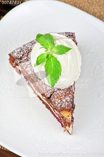 Image of chocolate cake with jam ice cream