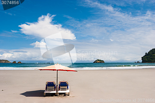 Image of Two Chairs at the Beach