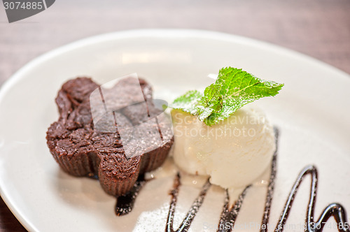 Image of chocolate cake with ice cream