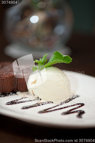 Image of chocolate cake with ice cream