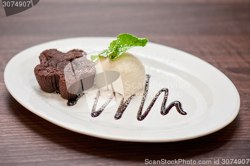 Image of chocolate cake with ice cream