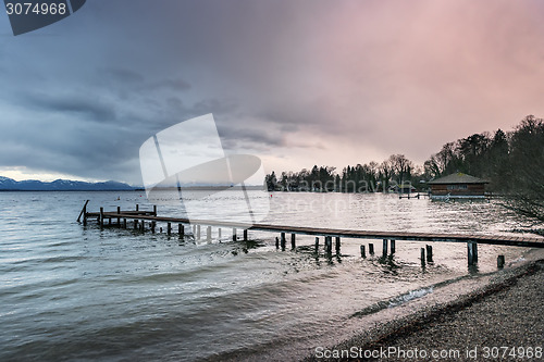 Image of Lake at sunset with landing stage