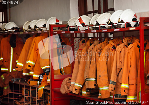 Image of Firefighting Equipment Arranged on Racks at the Fire Station