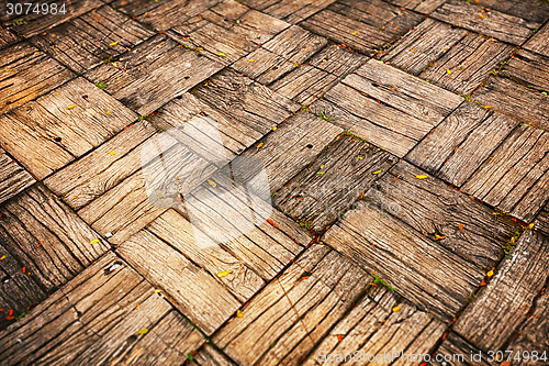 Image of Weathered Parquet Style Decking at Oblique Angle