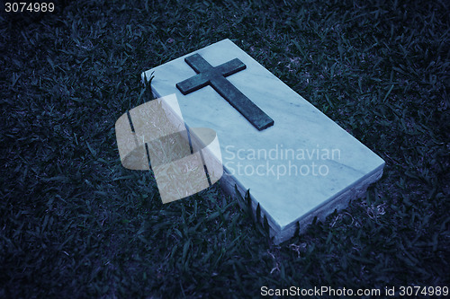 Image of Grave marker at a cemetery in Singapore, in black and white