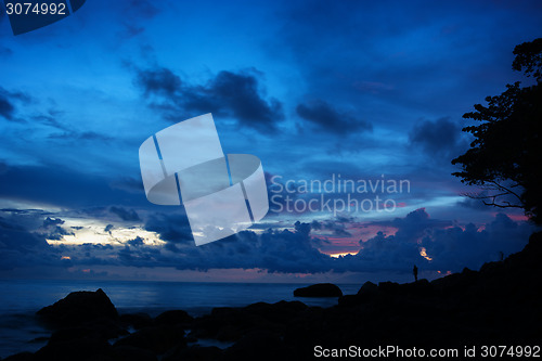 Image of Silhouette of Tropical Beach at Dusk