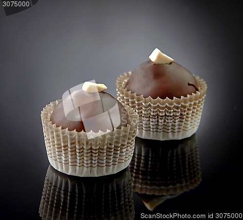 Image of two chocolate candies