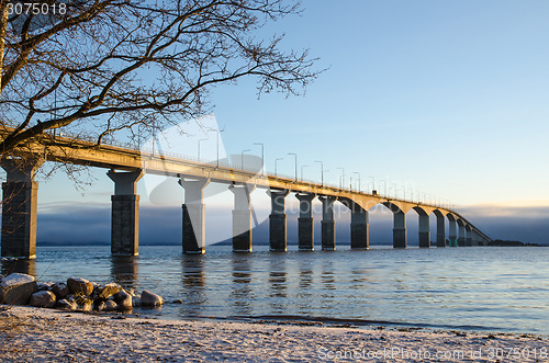 Image of Winter beach by the bridge