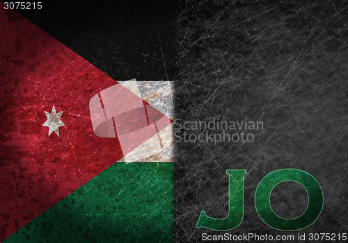 Image of Old rusty metal sign with a flag and country abbreviation