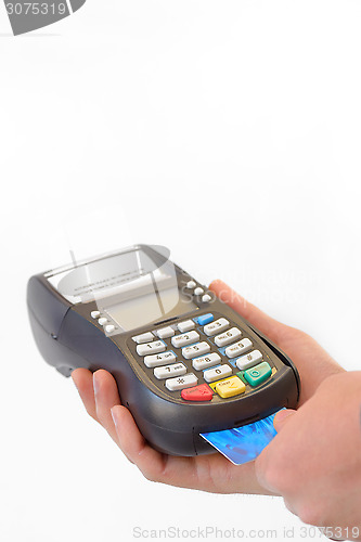 Image of Male hand enters PIN code on payment terminal 