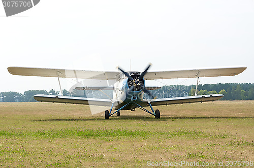 Image of AN2 airplane with rotating propeller.