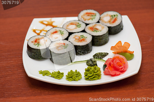 Image of sushi rolls with crabs meat