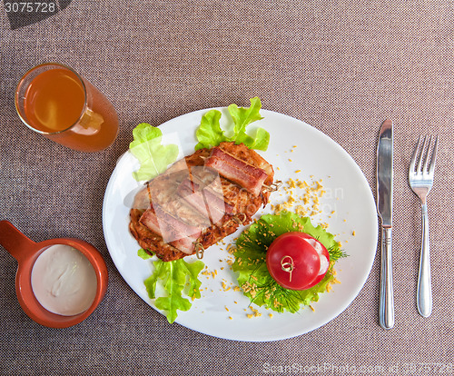 Image of veal meat with bacon