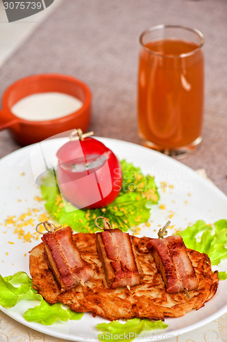 Image of veal meat with bacon
