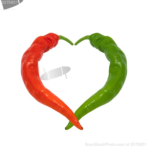 Image of Red and green chili peppers in love