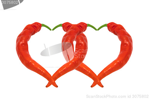 Image of Two hearts composed of red chili peppers